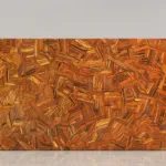 Large wall panel featuring a geometric pattern of interlocking wooden blocks in brown shades for a warm textured look.