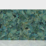 Green jasper stone slab with gold accents