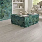 Jasper green with gold accents decorative pieces in living room