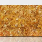 Large rectangular slab of textured golden-brown onyx with irregular patterns and a glossy finish.