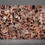 Large polished slab featuring interlocking reddish-brown crystals and veins, creating a textured earthy appearance.