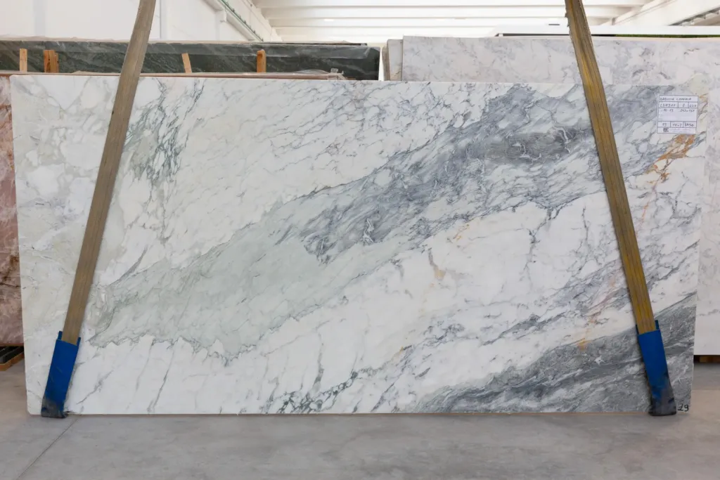 Breccia capraia marble slab in a natural stone storefront.