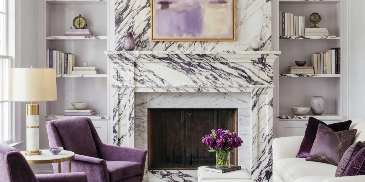 Calacatta Viola marble fireplace in a living room with violet accents.