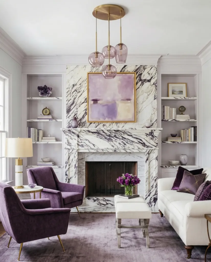 Living room with a bookmatched Calacatta Viola marble fireplace